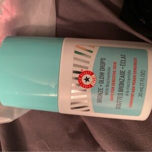 First Aid Beauty Mint Aqua and White Dropper Bottle